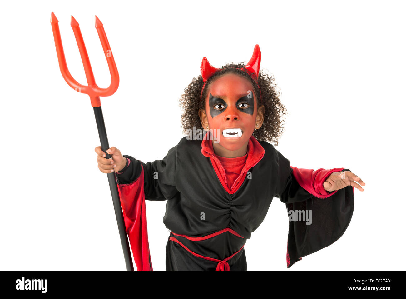 Girl with facepaint and devil Halloween costume isolated in white