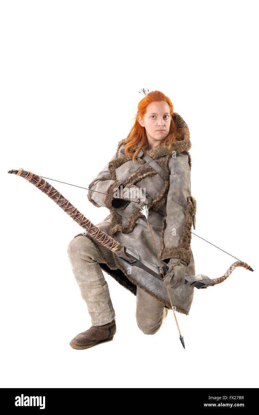 girl archer in a costume with bow isolated in white Stock Photo
