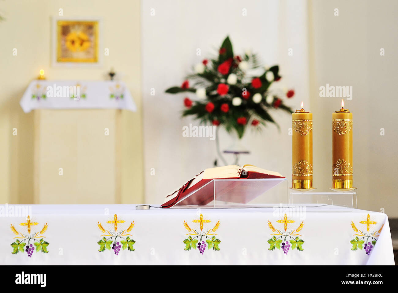 Two burning candles in the temple for worship Stock Photo Alamy