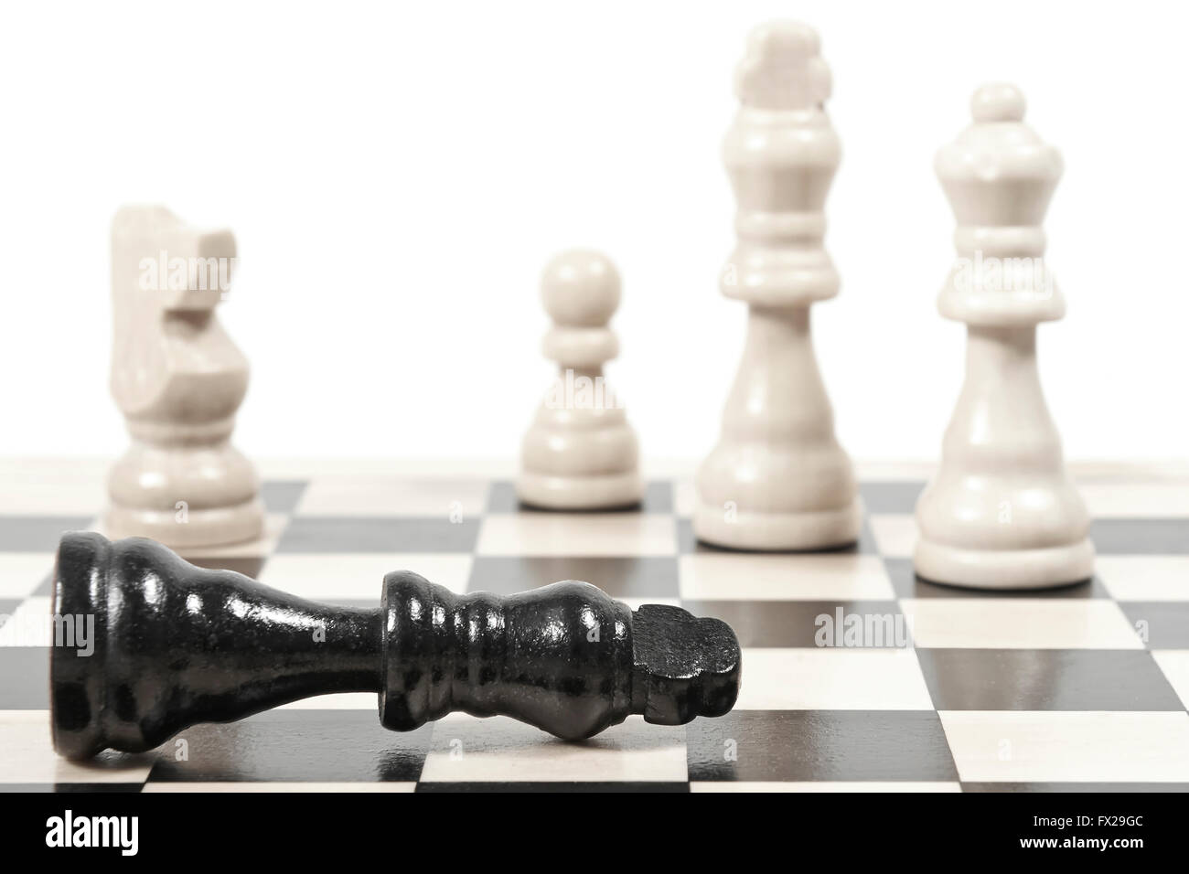 A completed chess game setup on a table with opposing chairs in a dark room  backlit by a bright window light - 3D render Stock Photo - Alamy