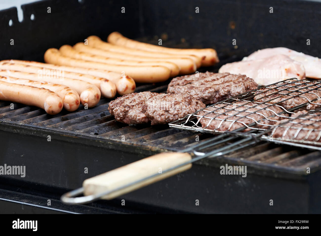 Barbecue meat on grill hi-res stock photography and images - Alamy