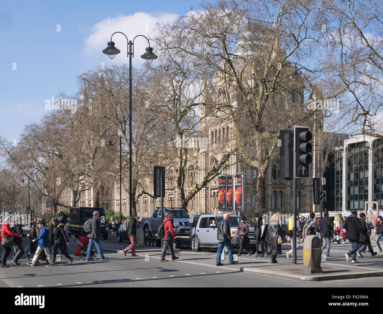 Pedestrians crossing the Cromwell Road near the Natural History Museum London England UK Stock Photo
