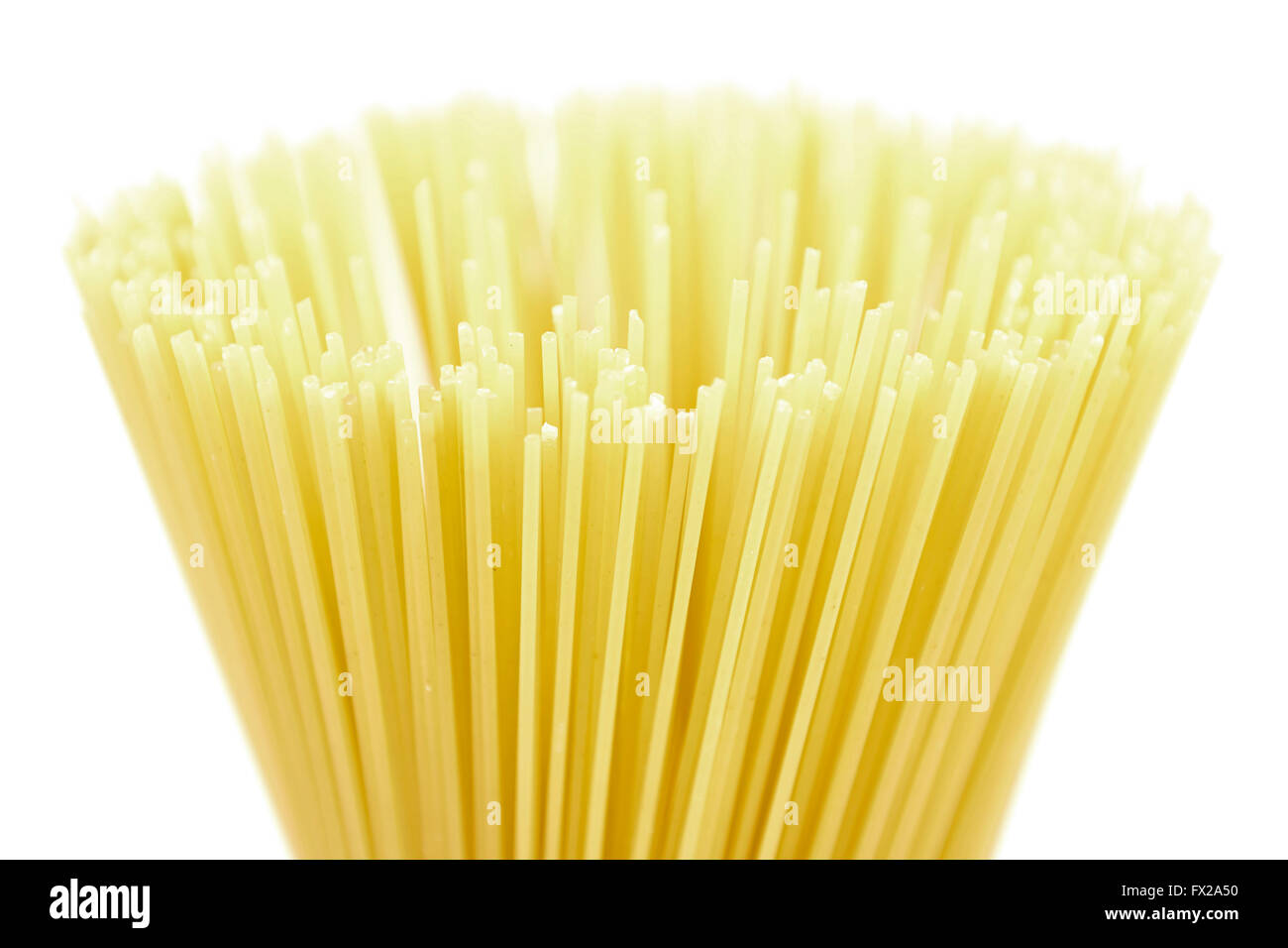 Raw spaghetti isolated on a white background Stock Photo - Alamy
