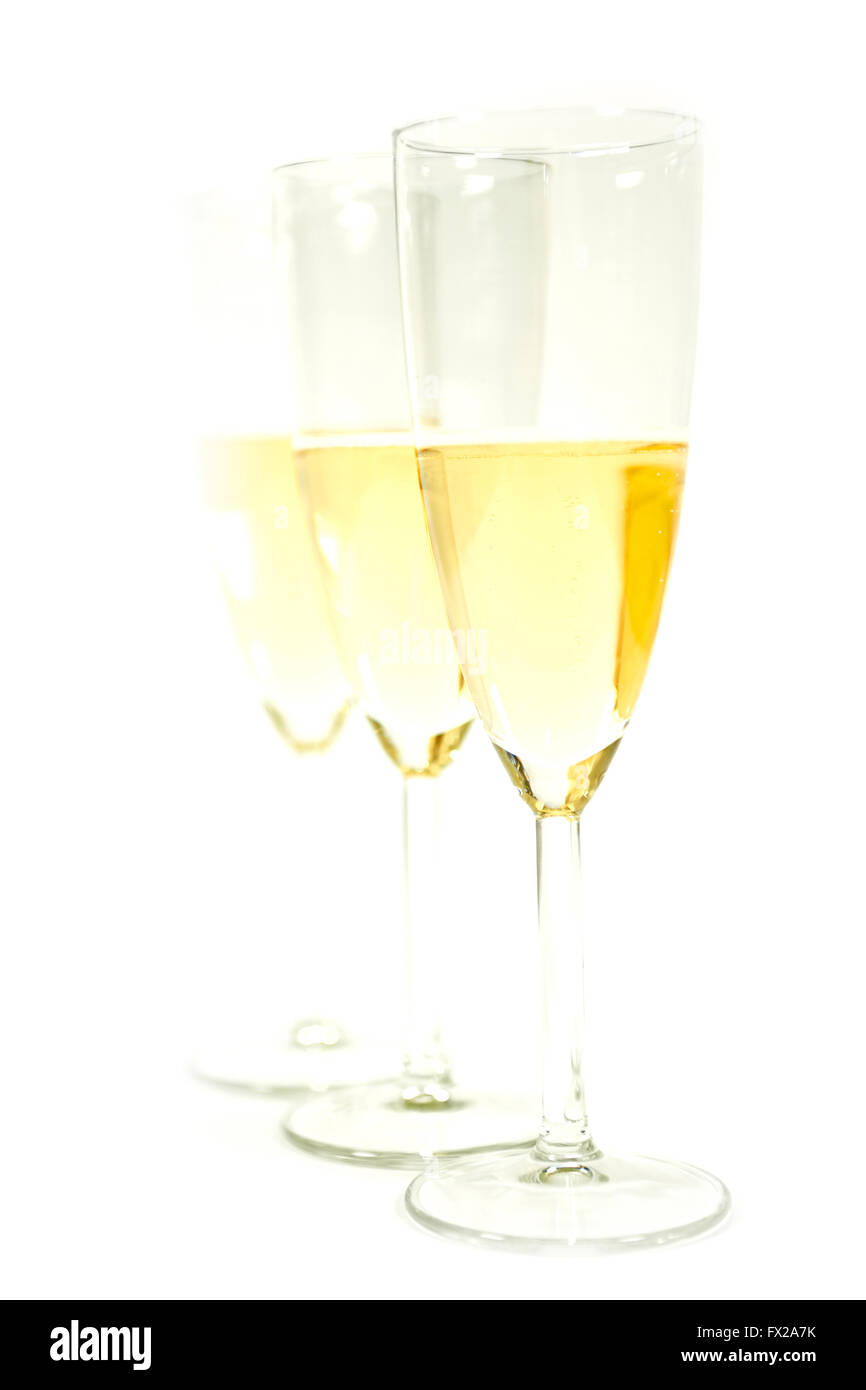 Three glasses of champaign shoot in high key with white background Stock Photo