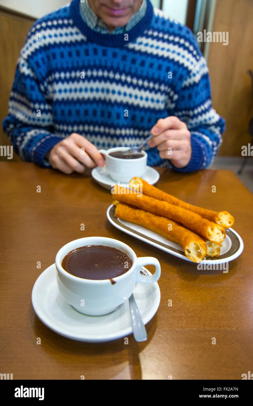 Porras with chocolate for breakfast. Madrid, Spain. Stock Photo