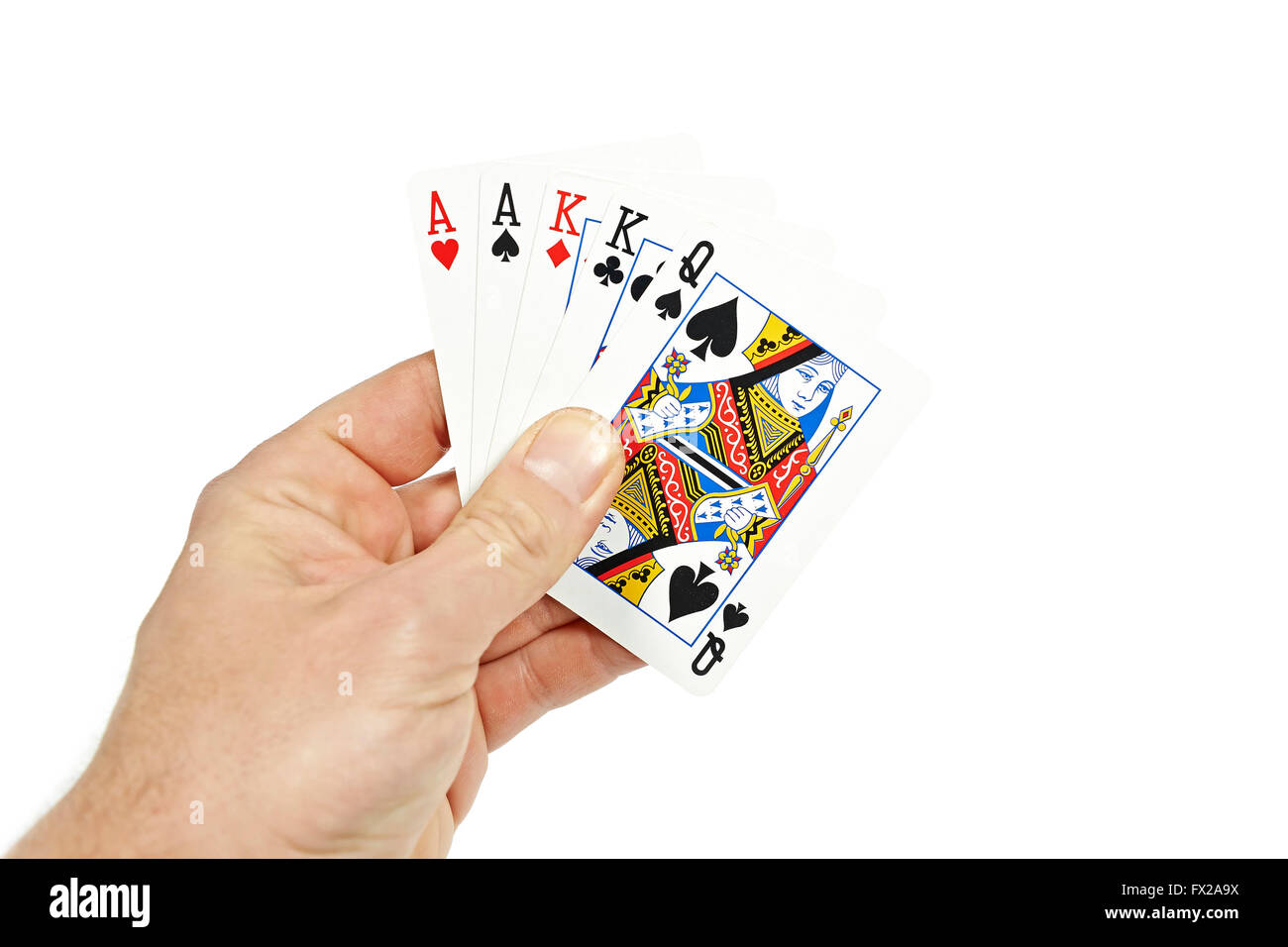 The hand of a Poker player holding two pair Stock Photo