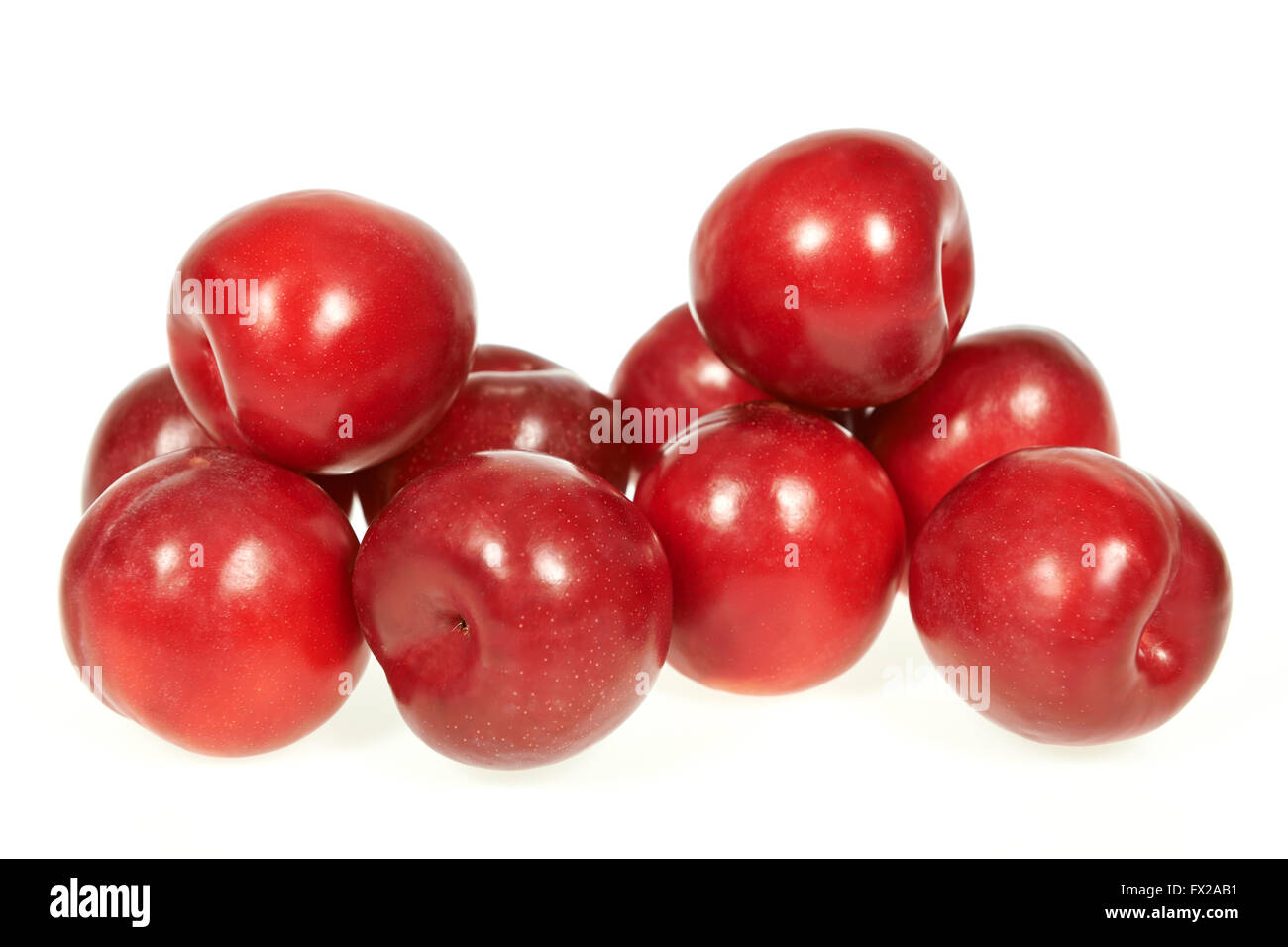 Mature plum fruits isolated on a white background Stock Photo