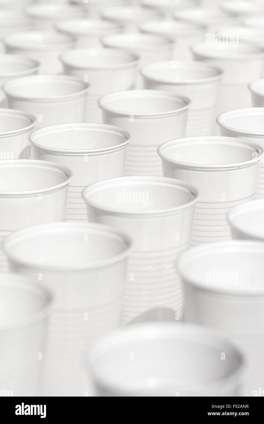 Endless rows of white plastic cups Stock Photo