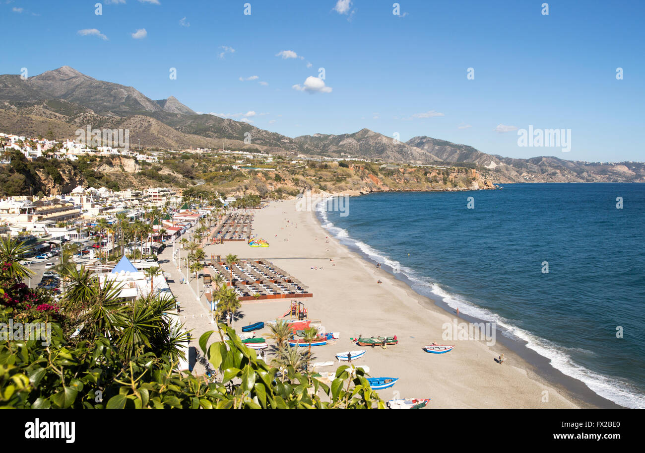 Playa Burriana sandy beach at popular holiday resort town of Nerja, Malaga province, Spain Stock Photo