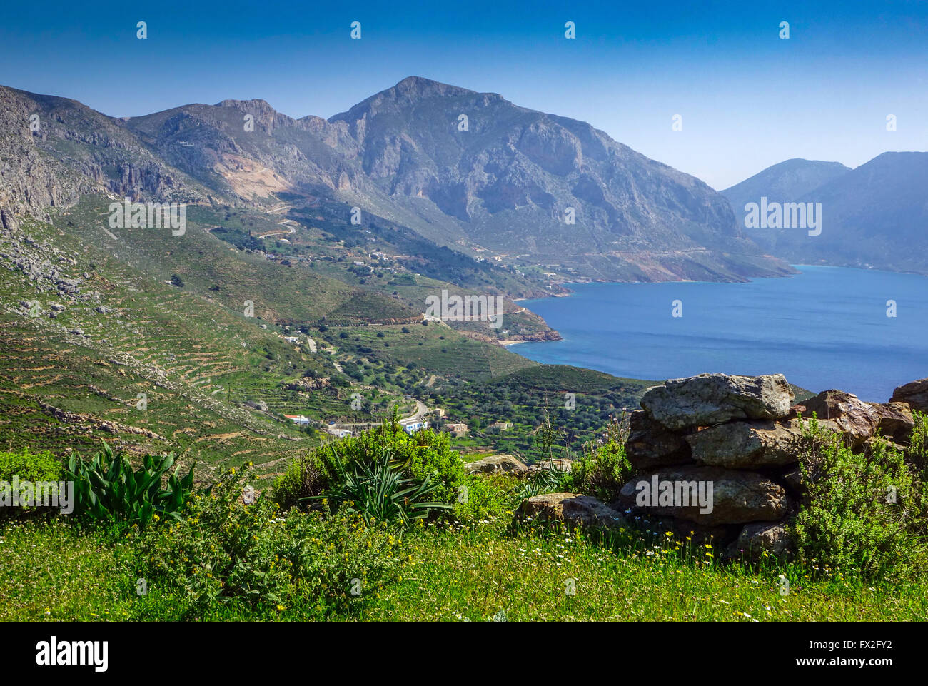 Blue sea and mountains at Emborios Bay Kalymnos, Greece Stock Photo