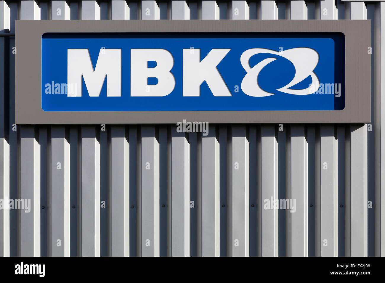 MBK logo on a wall. MBK a subsidiary of Yamaha Motor Company, is a french scooter manufacturer Stock Photo