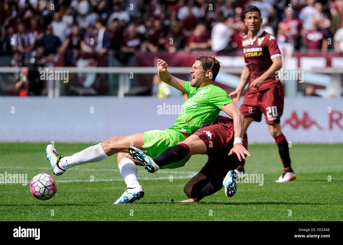Turin, Italy. 10 April, 2016: Guglielmo Stendardo (left) and Maxi Lopez compete for the ball during the Serie A football match between Torino FC and Atalanta BC at Olympic stadium in Turin. Credit:  Nicolò Campo/Alamy Live News Stock Photo