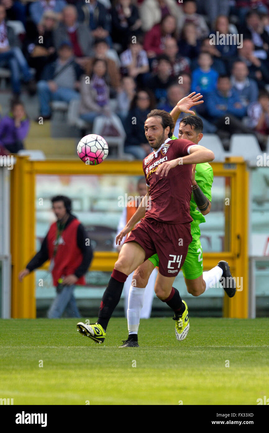 Turin, Italy. 10th April, 2016. Serie A Football. Torino versus Atalanta. Emiliano Moretti shields the ball from Mauricio Pinilla Credit:  Action Plus Sports Images/Alamy Live News Stock Photo
