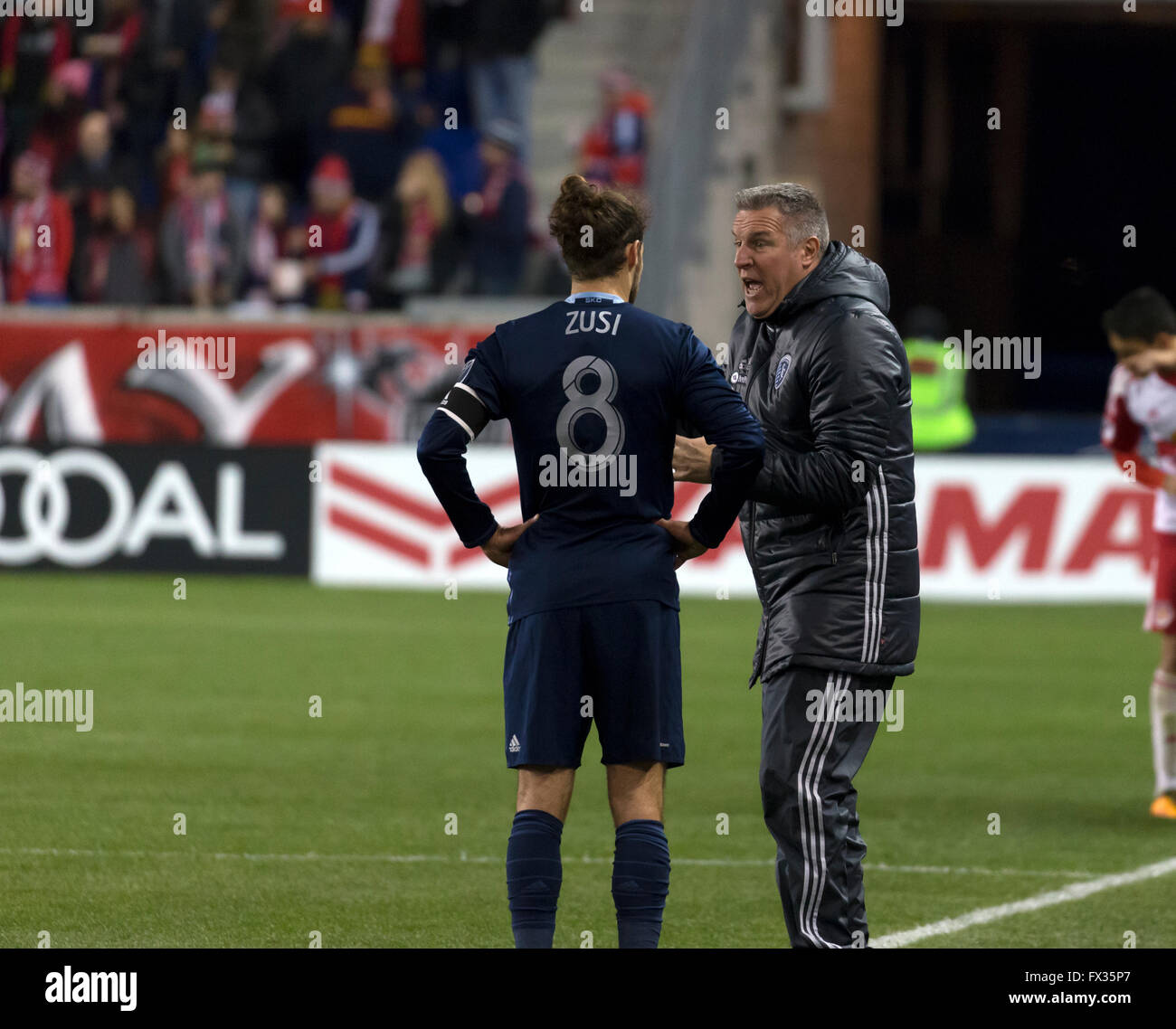 Harrison, New Jersey, USA. 9th April, 2016. Sporting Kansas City head coach Peter Vermes talks with Graham Zusi (8) during MLS soccer game against New York Red Bulls at Red Bull Arena Credit:  lev radin/Alamy Live News Stock Photo