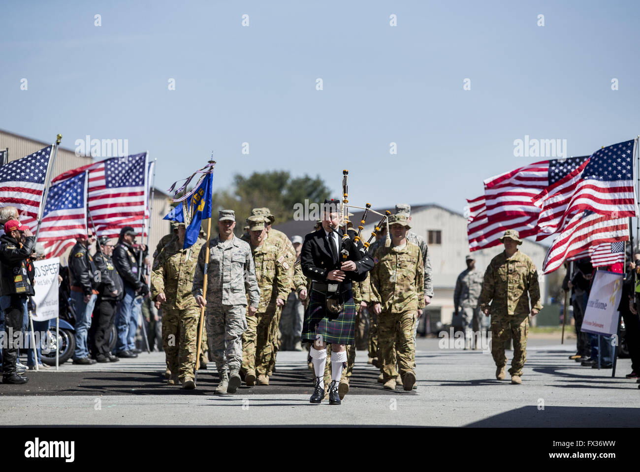 New Castle, Delaware, USA. 10th Apr, 2016. Members of the Delaware Air National Guard's 166th Airlift Wing march into a hangar at the air guard base for a homecoming and departure ceremony on Sunday afternoon. © ©/ZUMA Wire/Alamy Live News Stock Photo