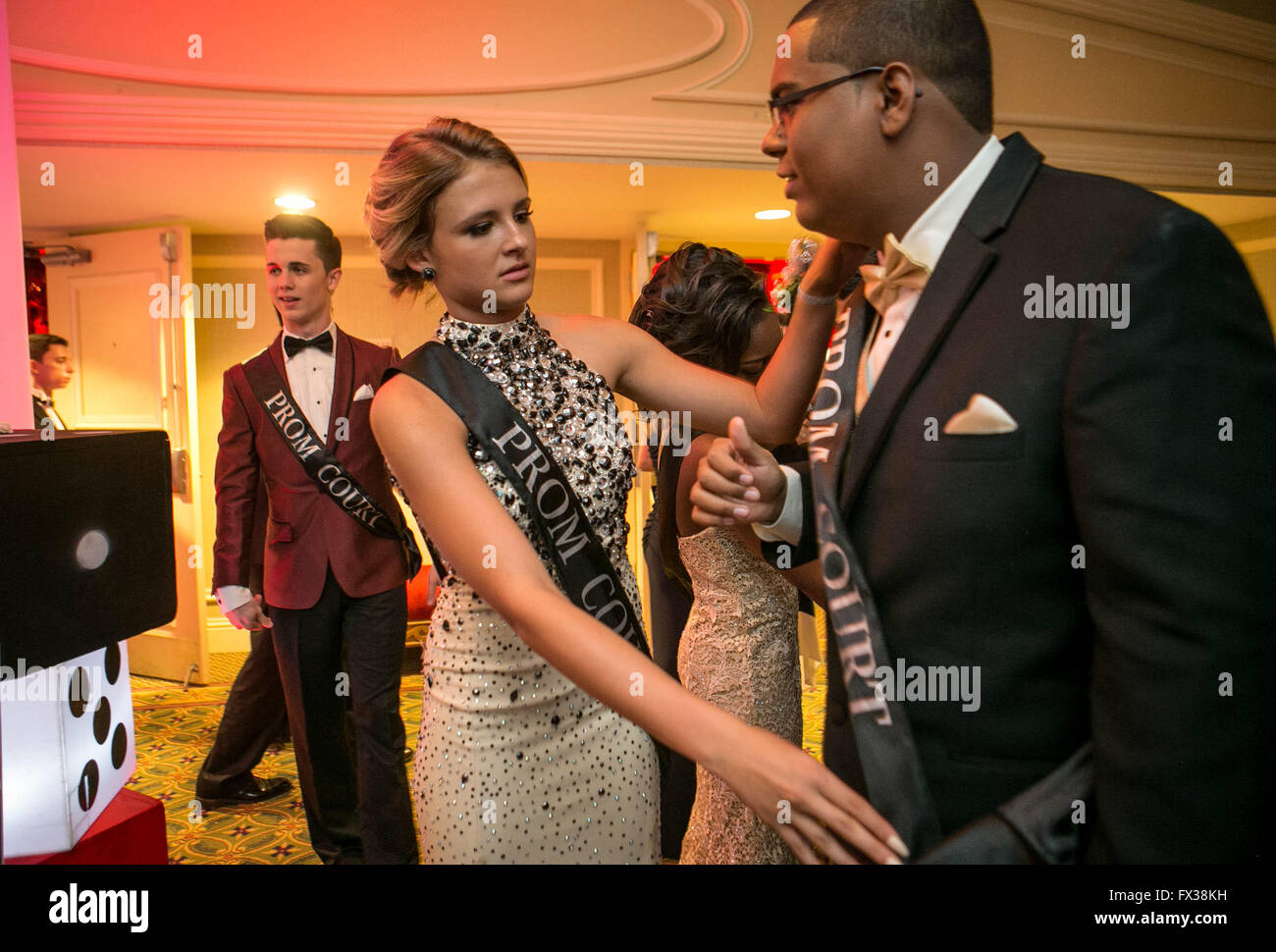 West Palm Beach, Florida, USA. 10th Apr, 2016. Mikal Bartosik straightens Jonathan Ramilo's prom court sash before the crowning of the prom King and Queen. © Allen Eyestone/The Palm Beach Post/ZUMA Wire/Alamy Live News Stock Photo