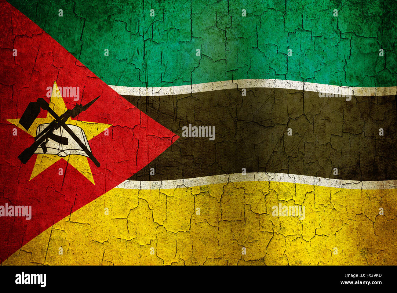 Mozambique flag on an old cracked wall Stock Photo