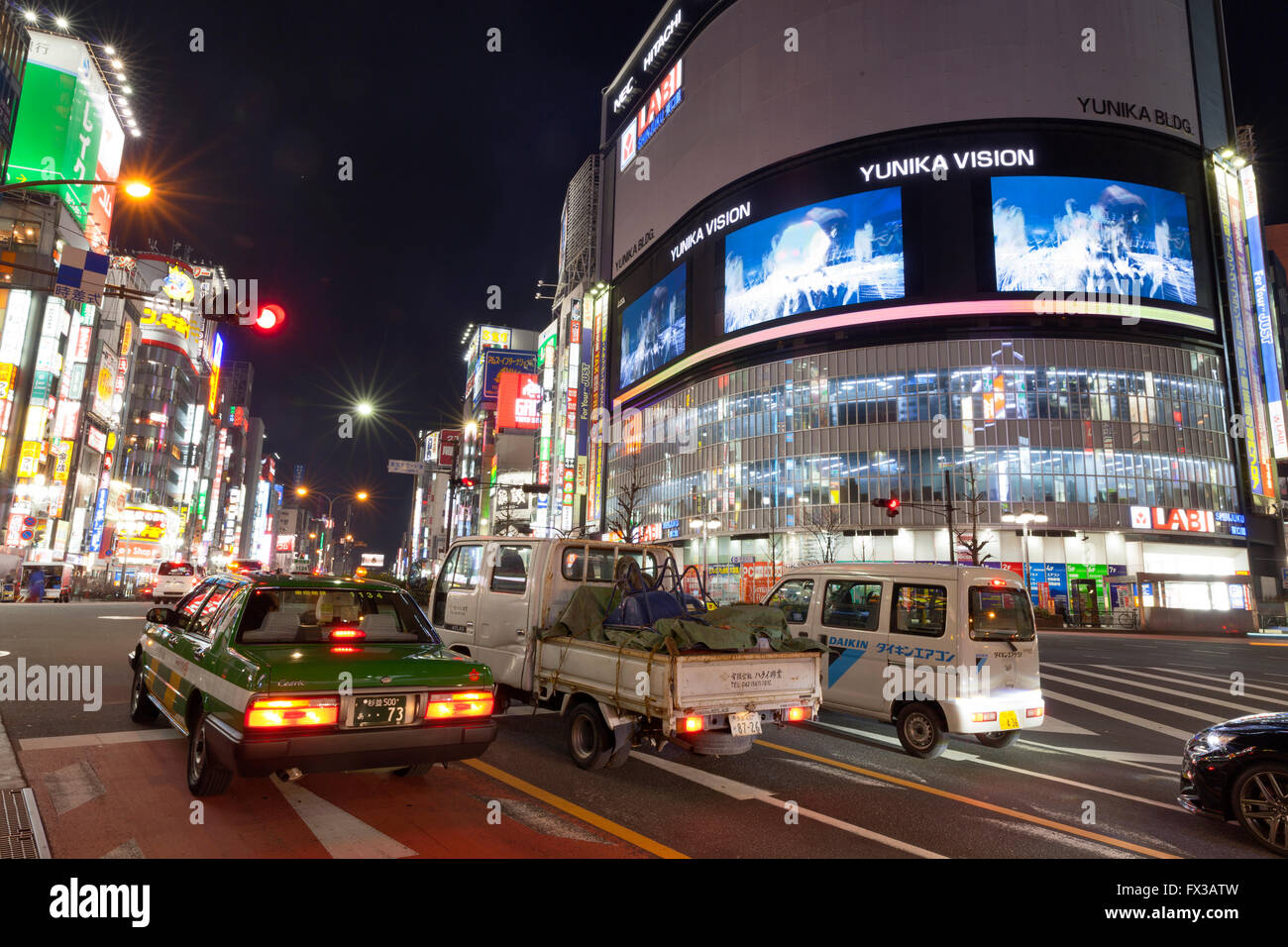 Car traffic in Shinjuku, Tokyo Stock Photo