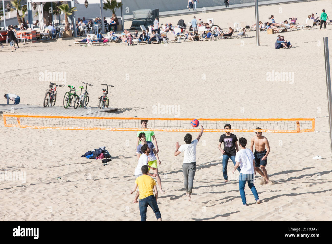 Playing Beach Volleyball on sandy sand at Playa,Plage, Nova Icaria