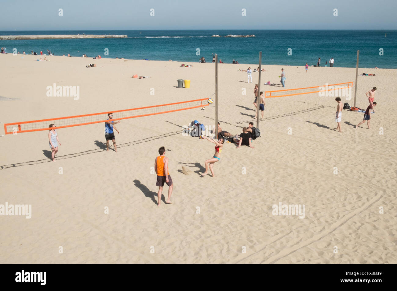 Playing Beach Volleyball on sandy sand at Playa,Plage, Nova Icaria