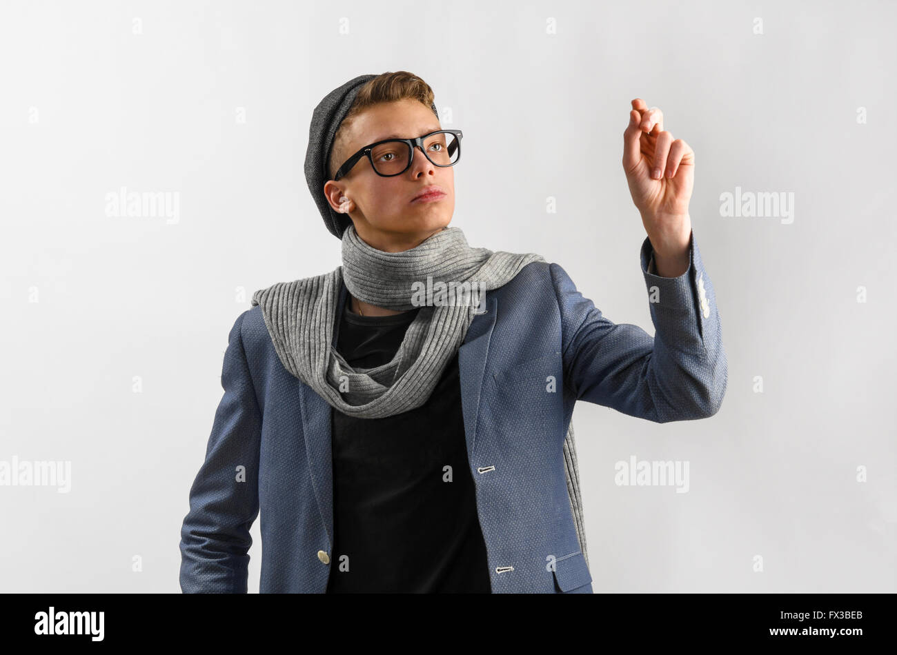 Hipster teen boy scarf glasses hi-res stock photography and images - Alamy