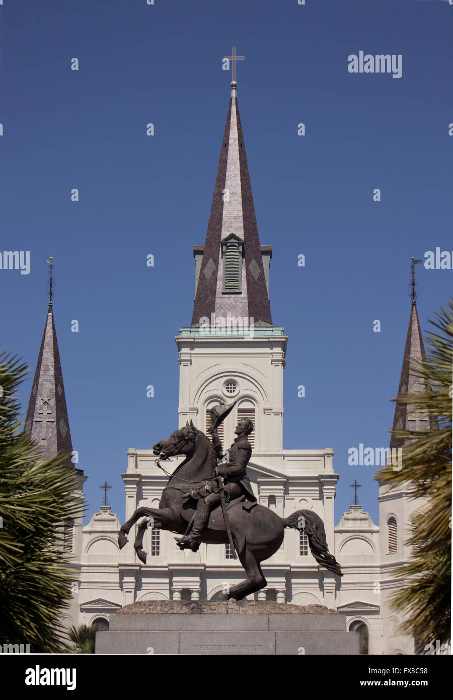 St. Lois cathedral spires, with Andrew Jackson sculpture in the foreground.  New Orleans, Jackson Square. Stock Photo