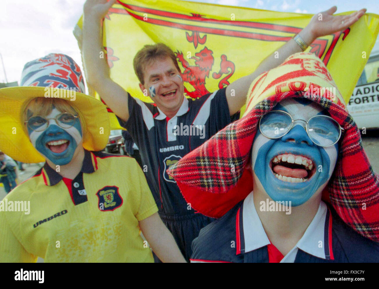Scottish football fans on their way to Hampden Stock Photo Alamy