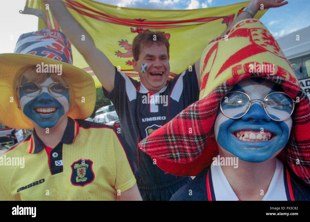 Scottish football fans on their way to Hampden Stock Photo Alamy