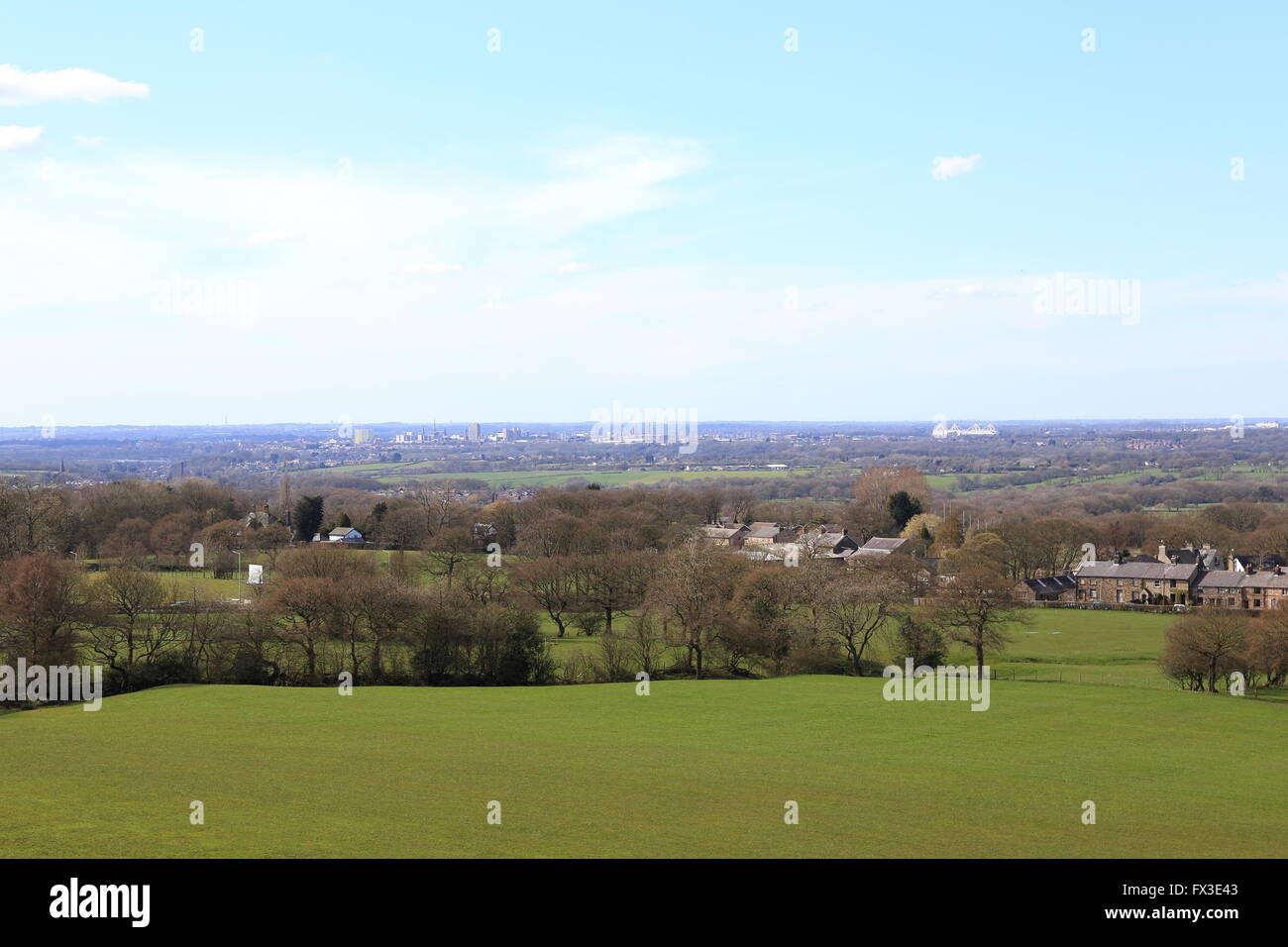 View from the village of Houghton in Lancashire looking towards the city of Preston in the distance. Blackpool tower on horizon. Stock Photo