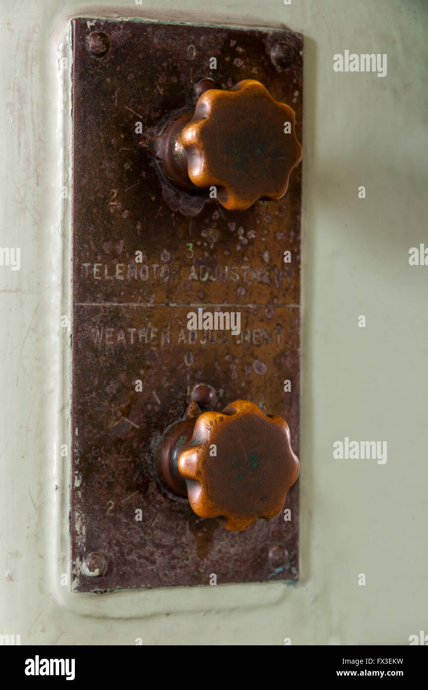 Old telemotor and Weater  adjustment buttons Stock Photo