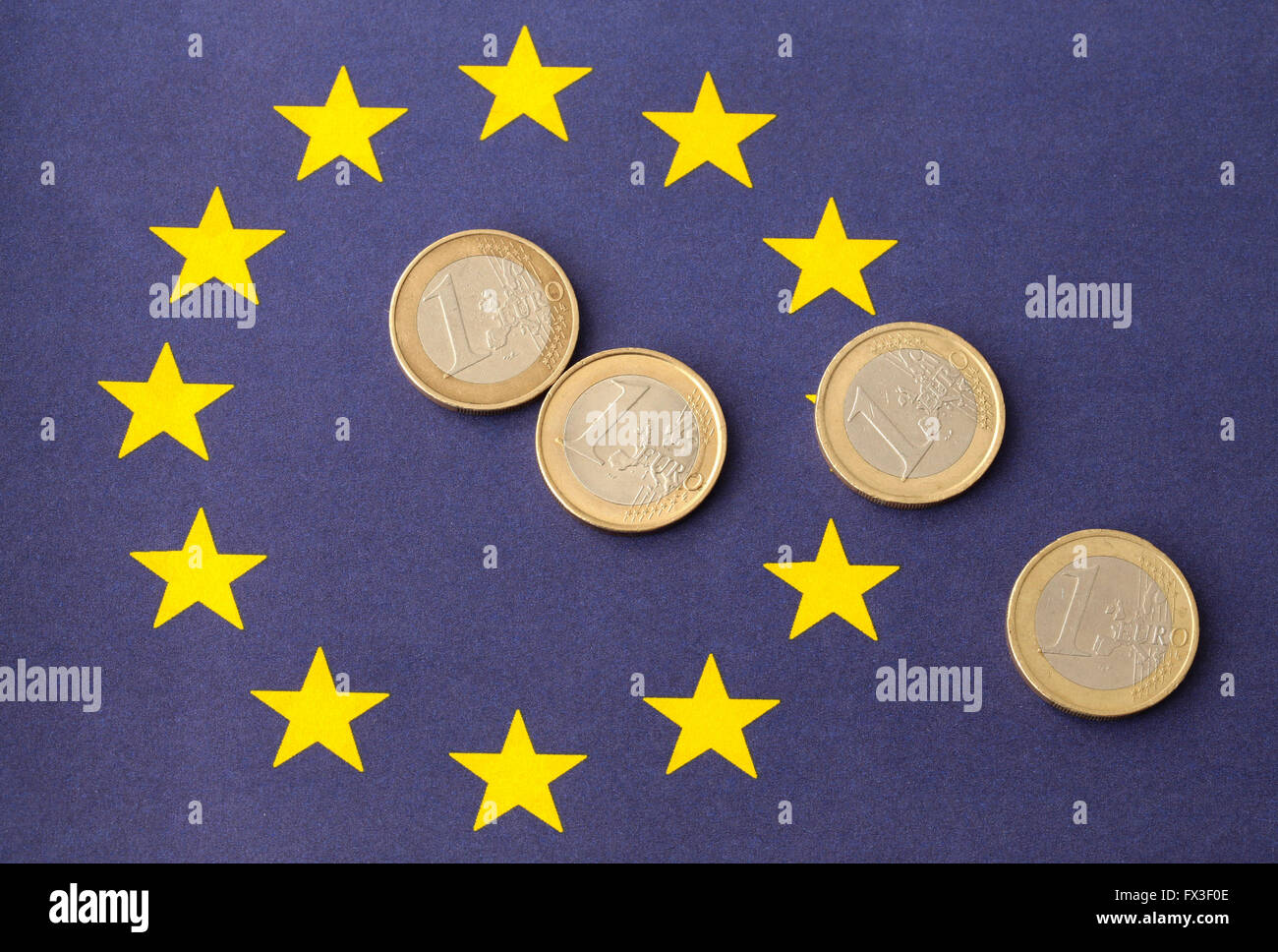 Euro's on top of the European flag Stock Photo