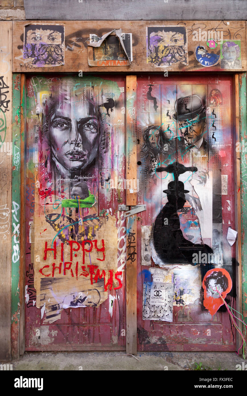 Graffiti on a doorway, Spitalfields, East London UK Stock Photo