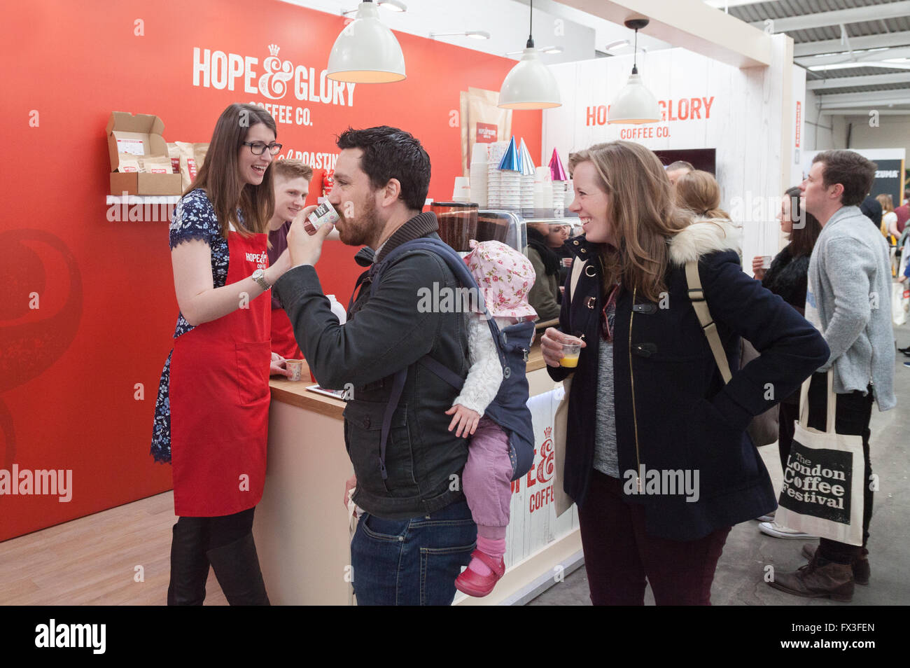 People tasting coffee at the London Coffee Festival, the Old Truman