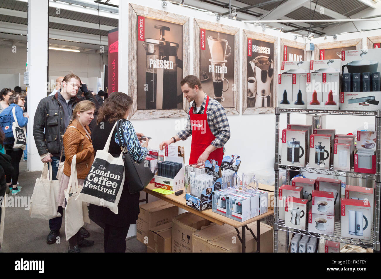 People tasting coffee at the London Coffee Festival, the Old Truman