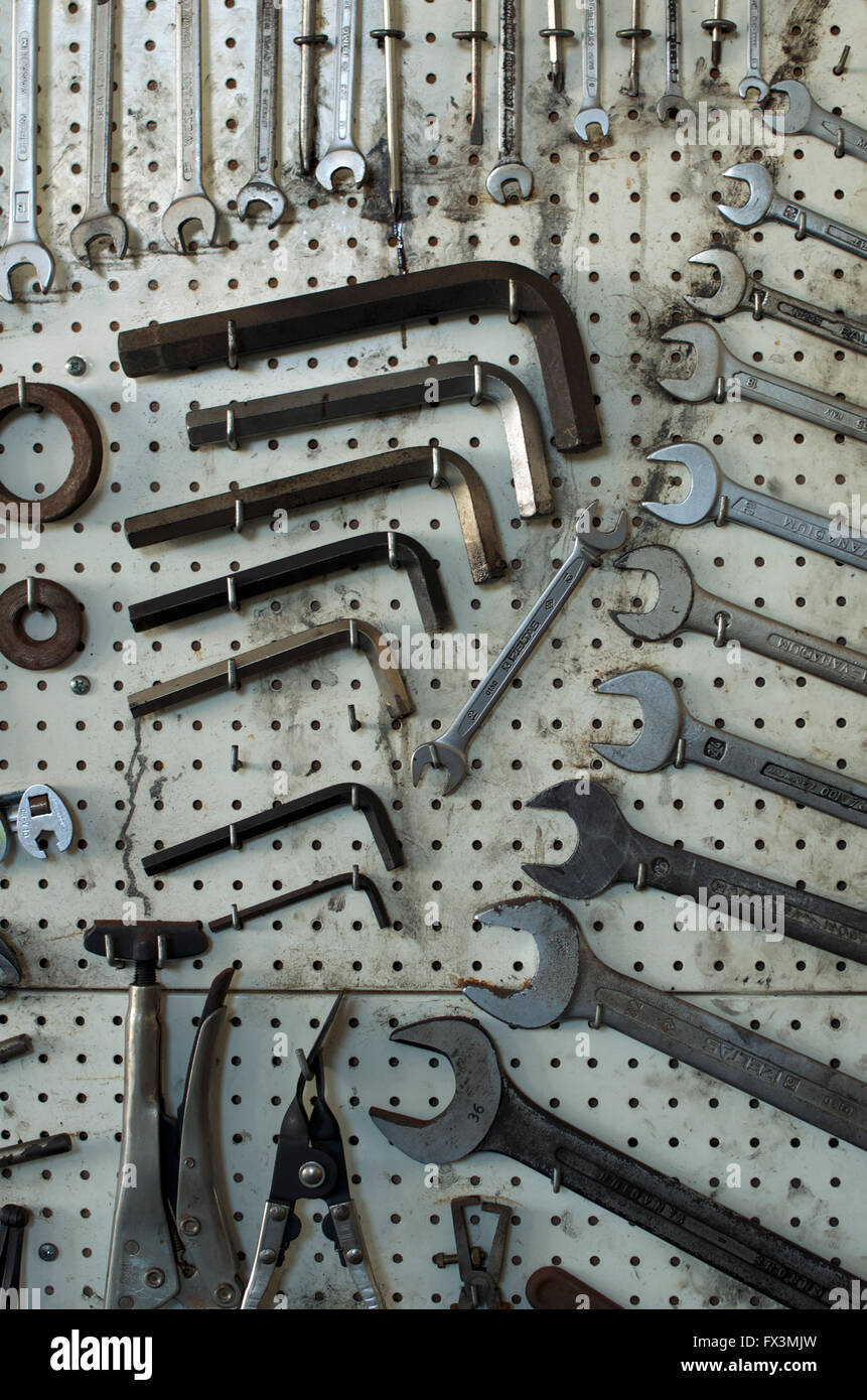 Assorted tools on a rack in a car Stock Photo Alamy