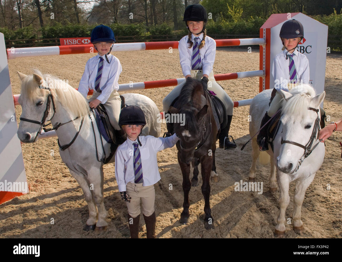 Pony Club meeting in Devonshire with help from olympic equestrian Mary King,where young girls practice show jumping and dressage. Stock Photo