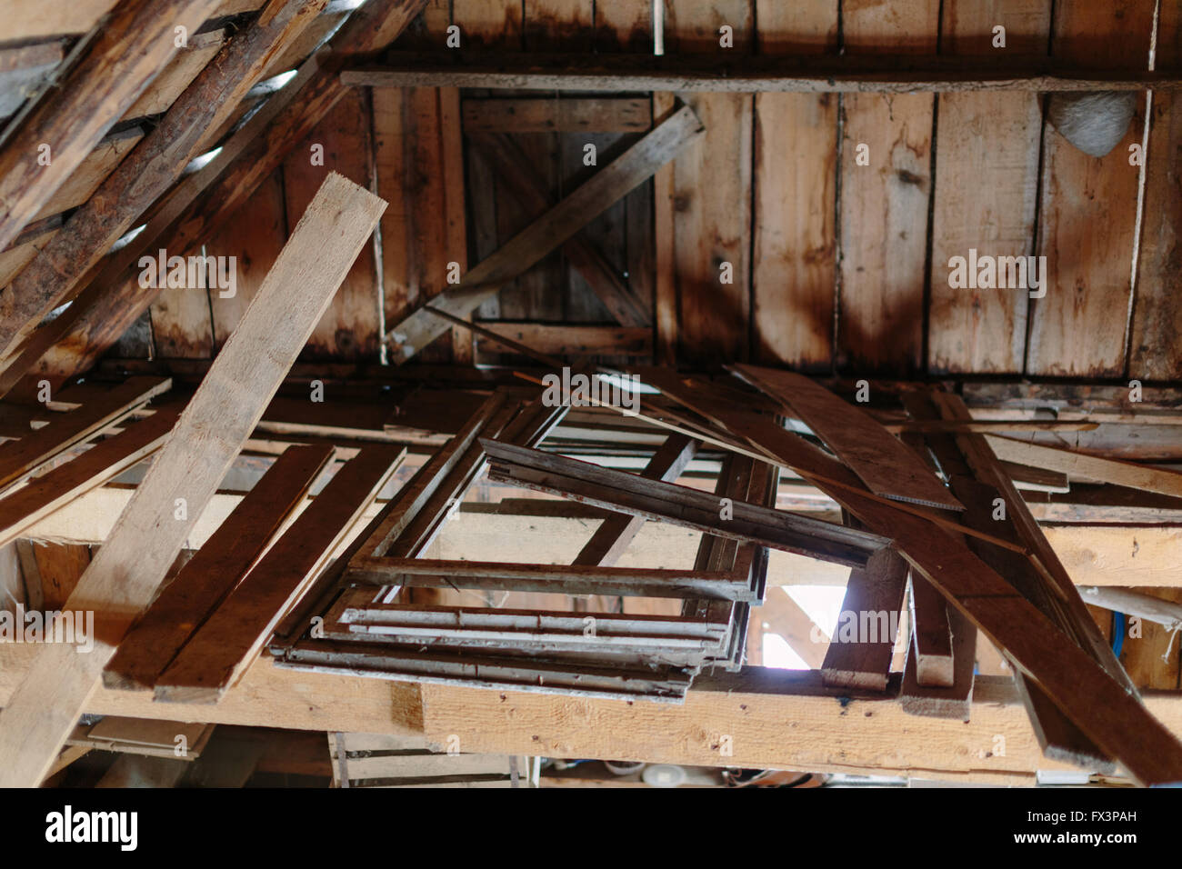 Destroyed wooden house inside photo. Stock Photo