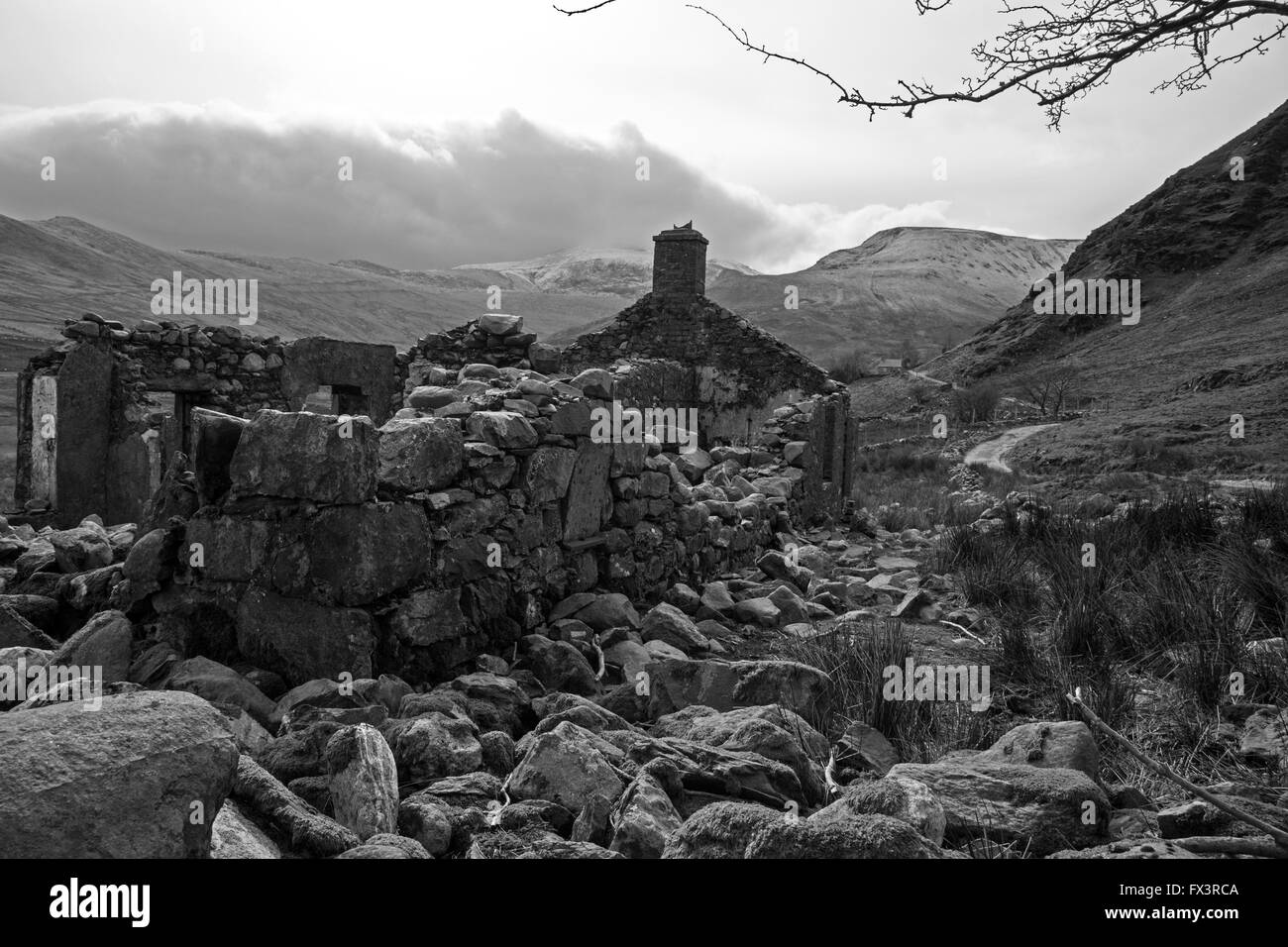 A ruined, abandoned stone built cottage, near Llanberis in the Snowdonia National Park in North Wales. Stock Photo
