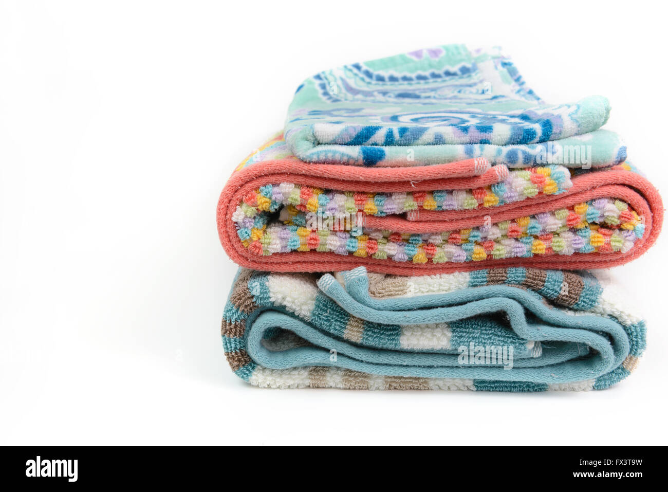 Clean colorful towel folding and stack on isolated background Stock Photo