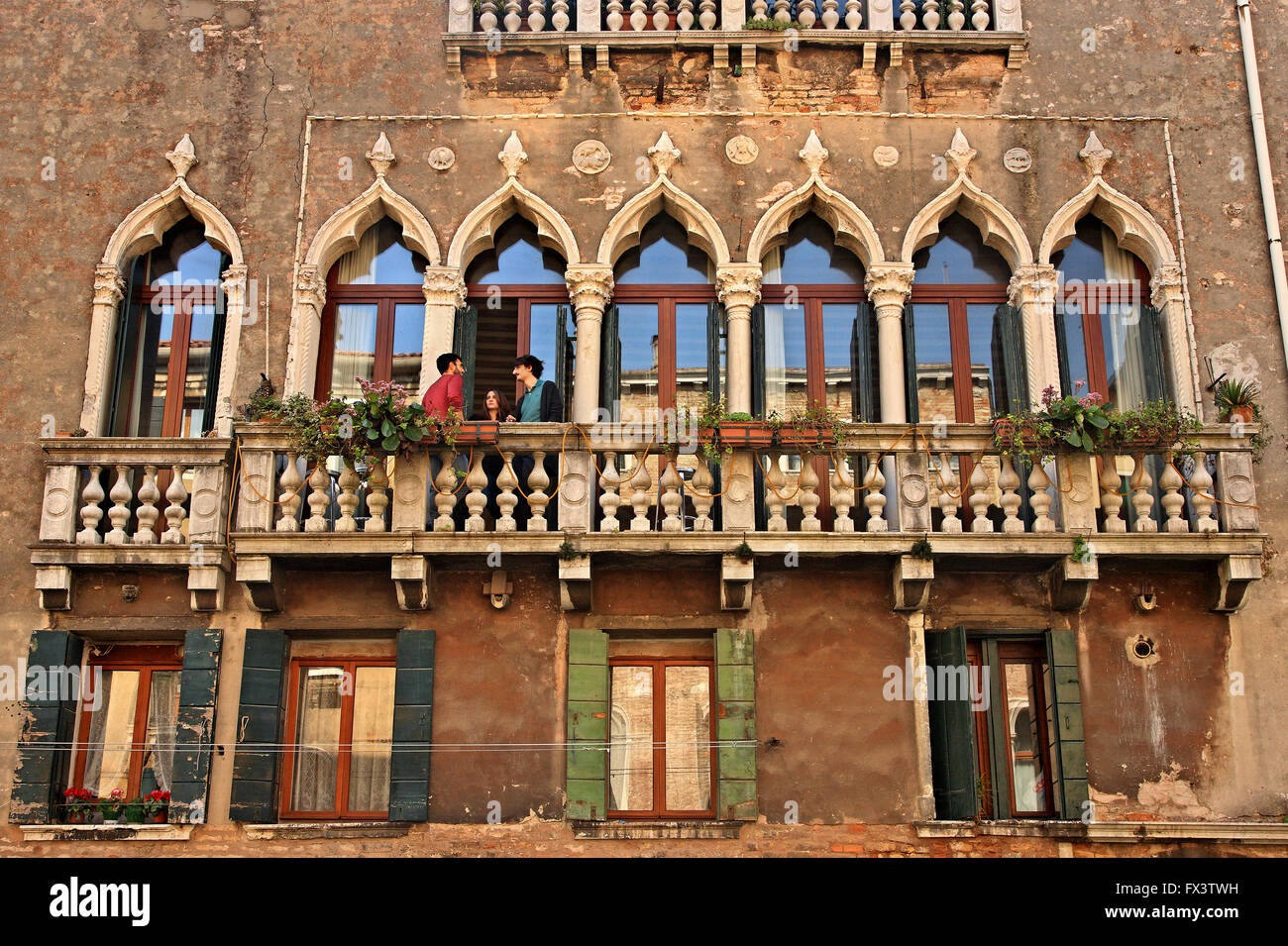 Beautiful balcony at Sestiere ('district') di Cannaregio, Venice, Veneto, Italy Stock Photo