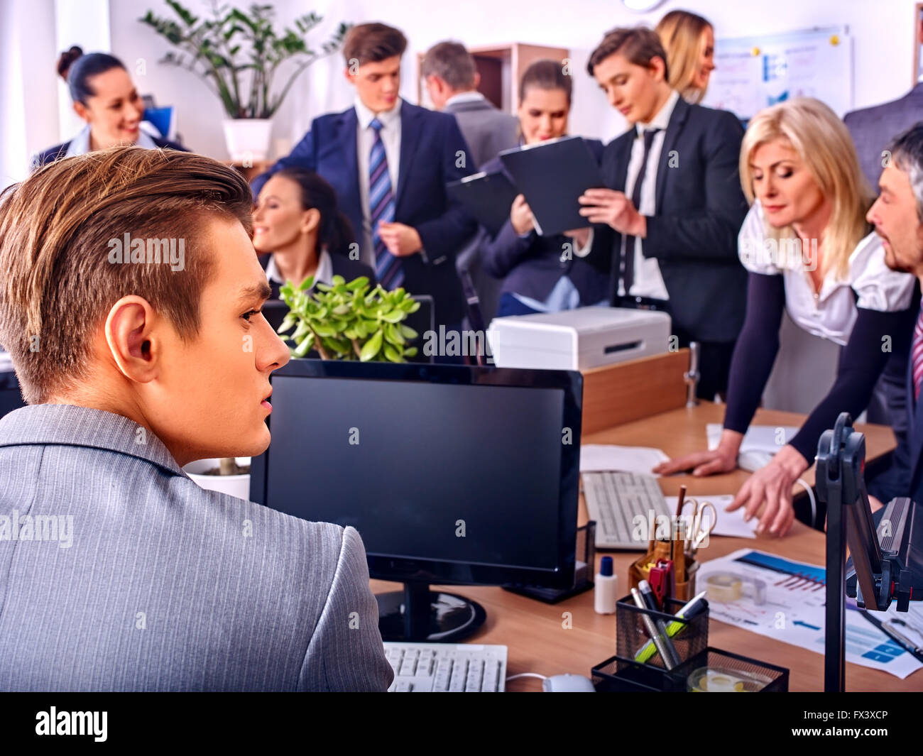 Group happy business people in office. People consulted Stock Photo - Alamy