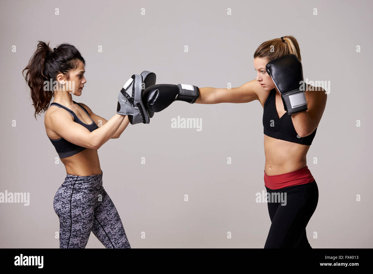 Young woman boxing training with her female sparring partner Stock Photo -  Alamy