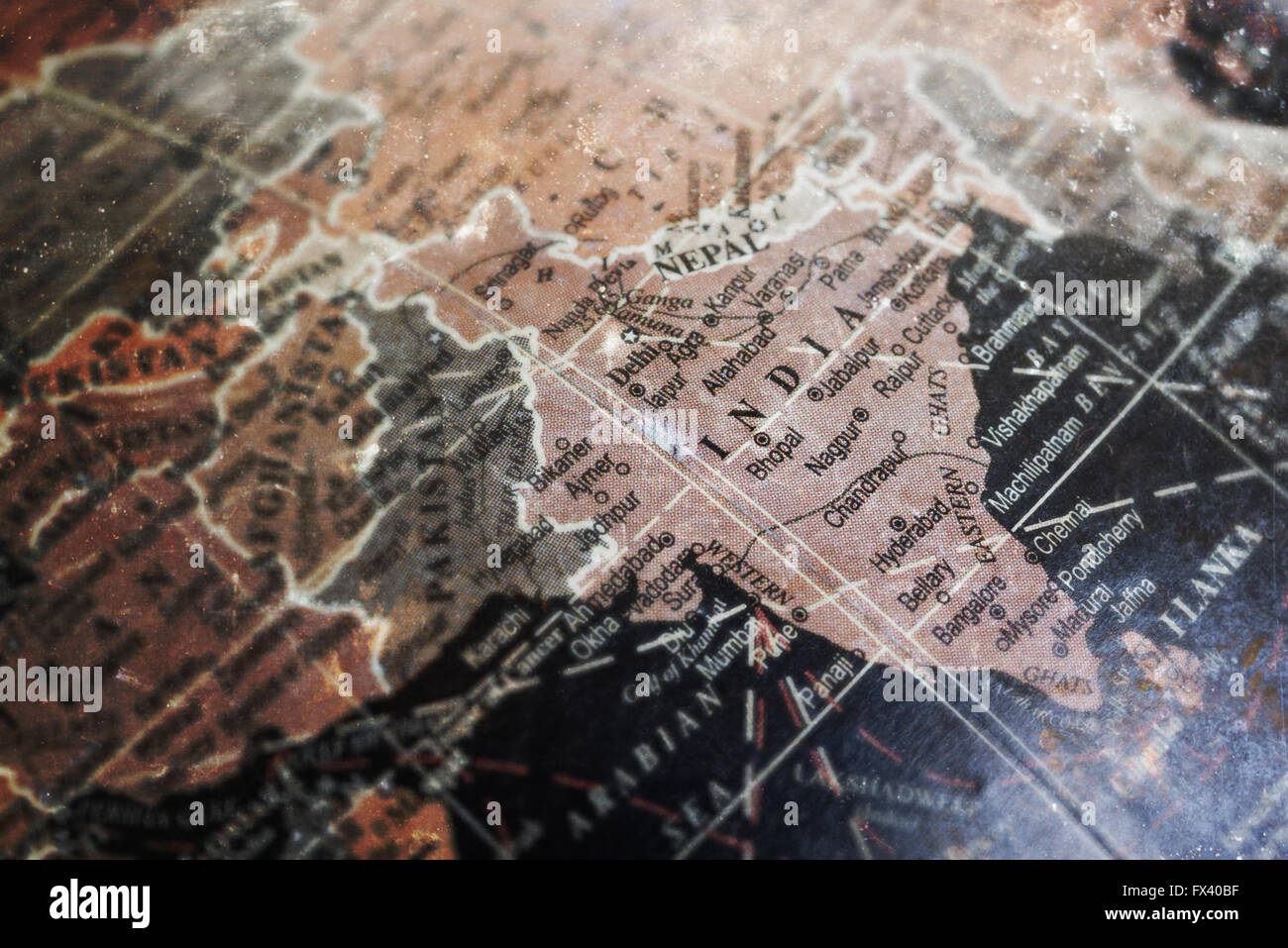 India map on vintage crack paper background, selective focus Stock Photo