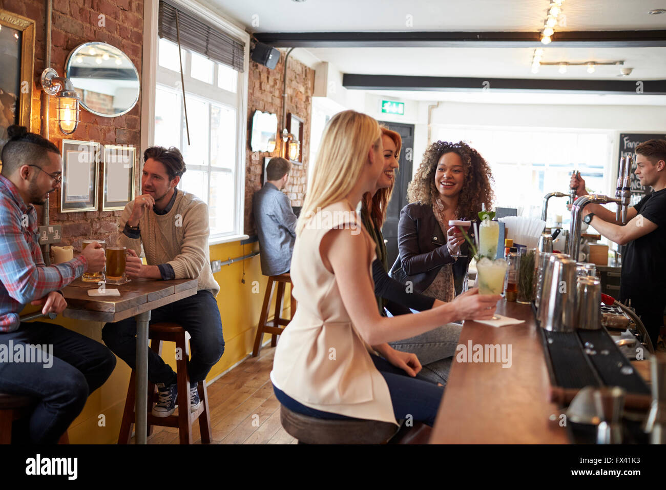 Interior View Of Busy Bar With Customers Stock Photo Alamy