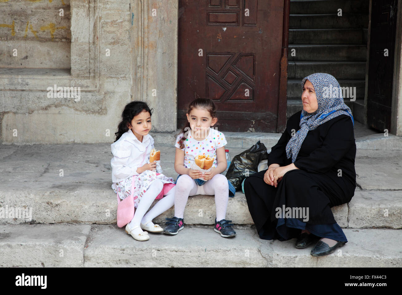 Two young children and a women, Istanbul, Turkey Stock Photo