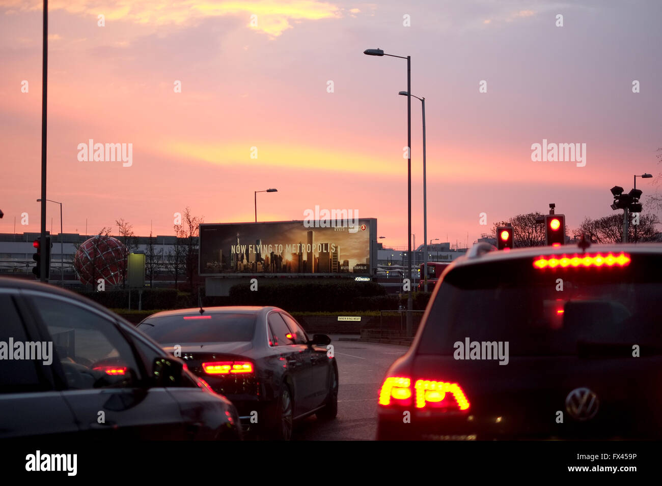 Turkish Airlines billboard on a roundabout at sunrise at Heathrow Airport, London, England, UK. Stock Photo