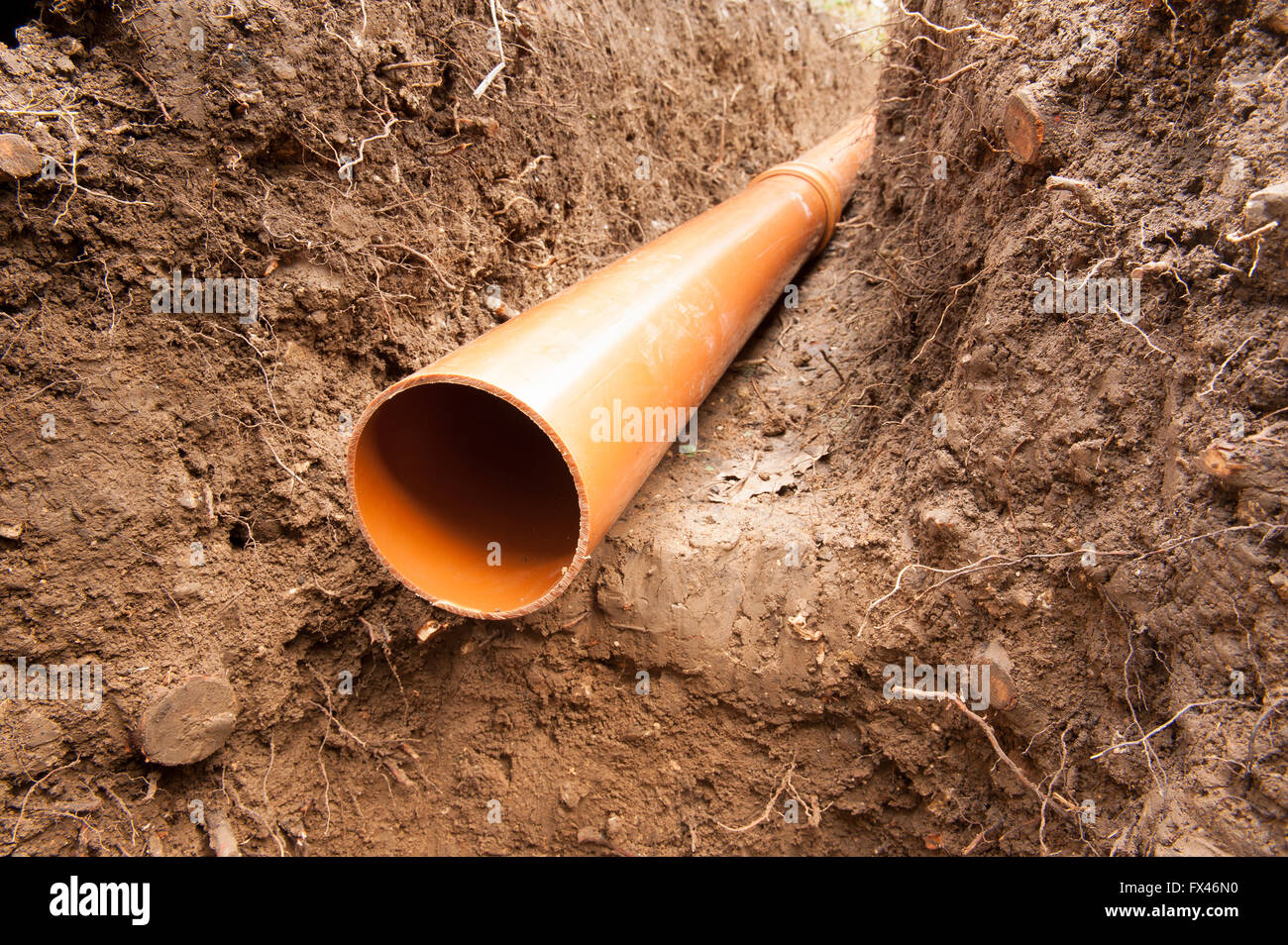 6m soil pipe run to comply with building regulations and soakaway for drainage in trench through 6m soil pipe run to comply with building regulations and soakaway for drainage in trench through