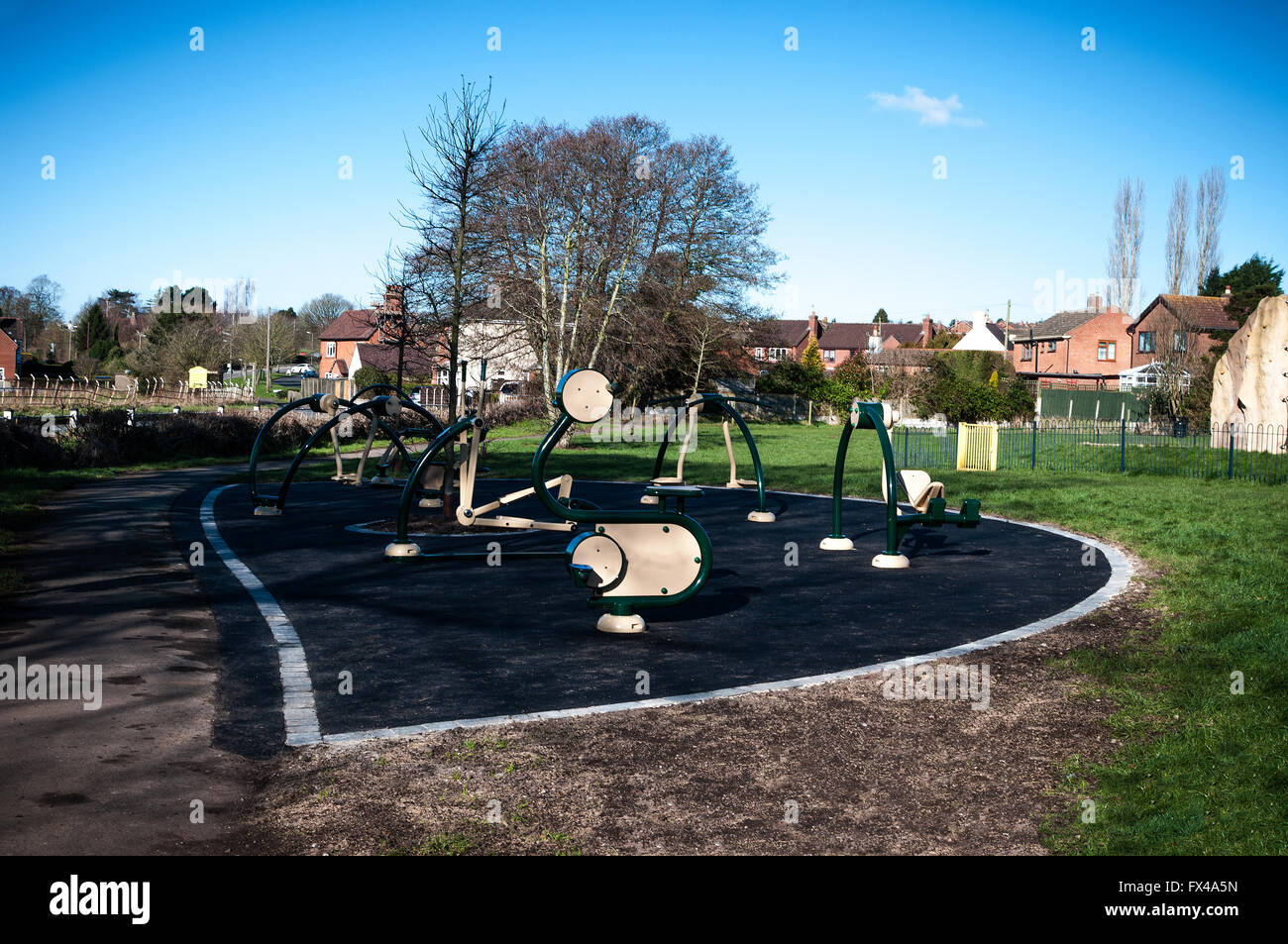 Outdoor gym equipment for public use in Lickey End Park, Bromsgrove. Stock Photo