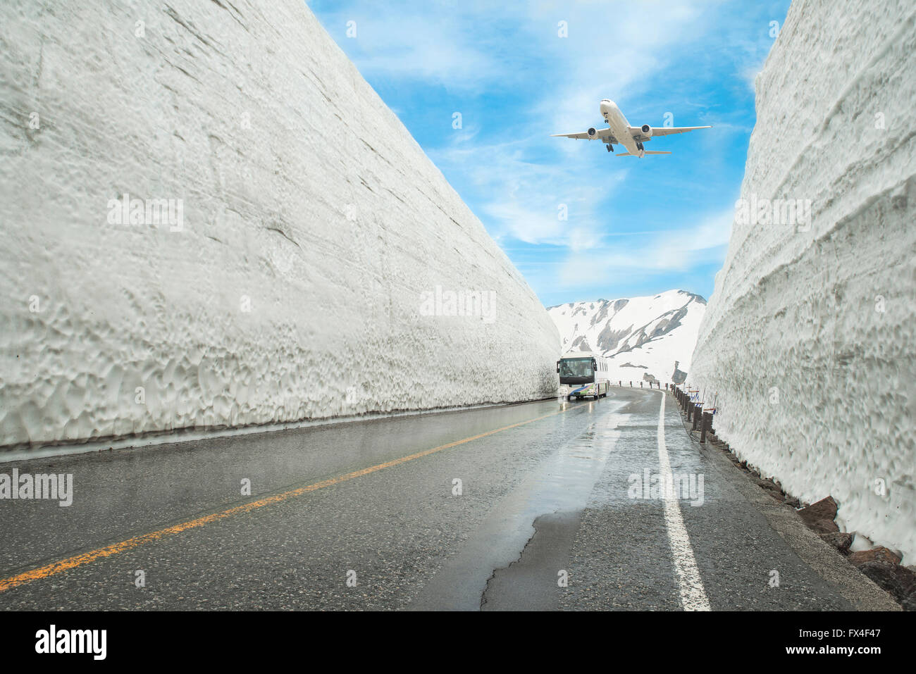 Airplane flying over Tateyama Kurobe Alpine Route, Toyama Prefecture, Japan Stock Photo