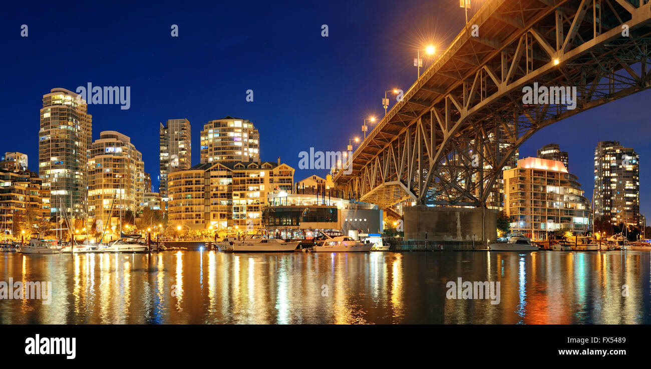 Vancouver False Creek at night with bridge and boat panorama Stock ...